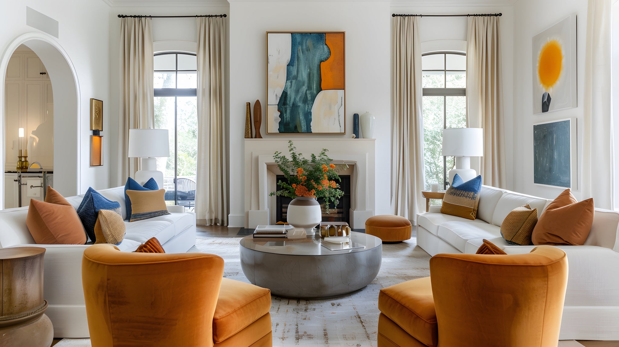Modern living room with white walls, orange chairs, and a fireplace.