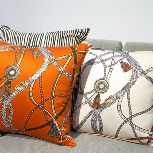Luxury H Style Paris orange throw pillow cover by The Finishing Touch Decor, featuring elegant H-shaped design and vibrant orange fabric.