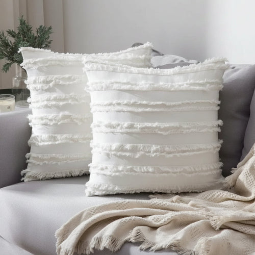 Boho textured fringe throw pillow cover by The Finishing Touch Decor featuring a soft, decorative design with fringed edges.