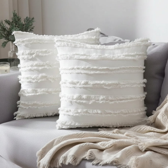 Boho textured fringe throw pillow cover by The Finishing Touch Decor featuring a soft, decorative design with fringed edges.