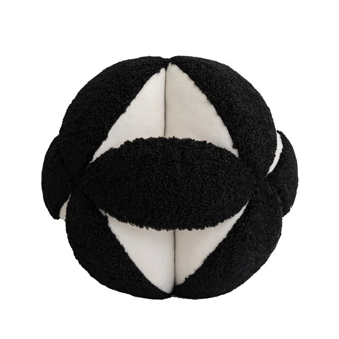 Modern round geometric ball throw pillows by The Finishing Touch Decor, featuring stylish circular patterns and plush fabric.