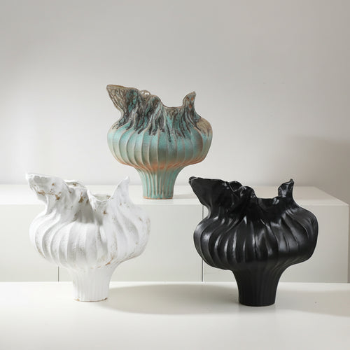 Irregular drip Wabi Sabi porcelain ceramic decorative vase with organic, imperfect design from The Finishing Touch Decor.