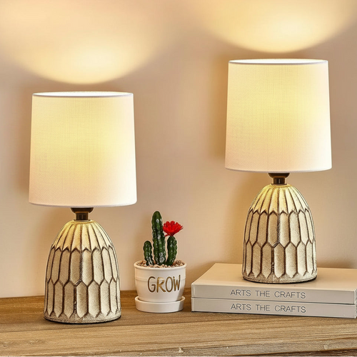 Set of two hand-painted boho ceramic table lamps, decorative lighting by The Finishing Touch Decor, featuring colorful, artistic designs.