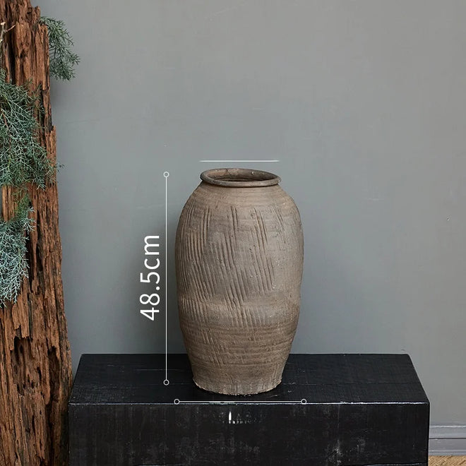 Rustic Zen large terracotta floor vase from The Finishing Touch Decor, decorative vase with a natural earthy finish.