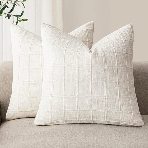 Textured neutral linen and cotton throw pillow cover from The Finishing Touch Decor, showcasing a stylish, soft fabric design.