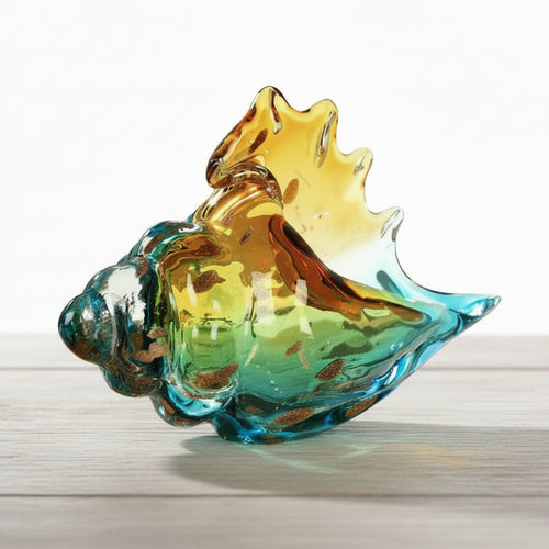 Hand-blown glass conch shell statue from The Finishing Touch Decor, coastal-themed table art for home decor accents.
