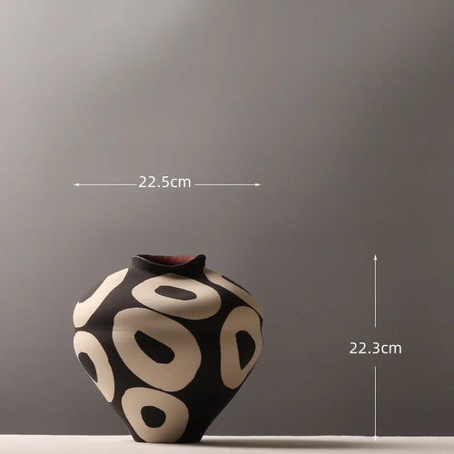 Hand-drawn geometric circles ceramic flower vase by The Finishing Touch Decor, ideal for flower arrangements and home decor.