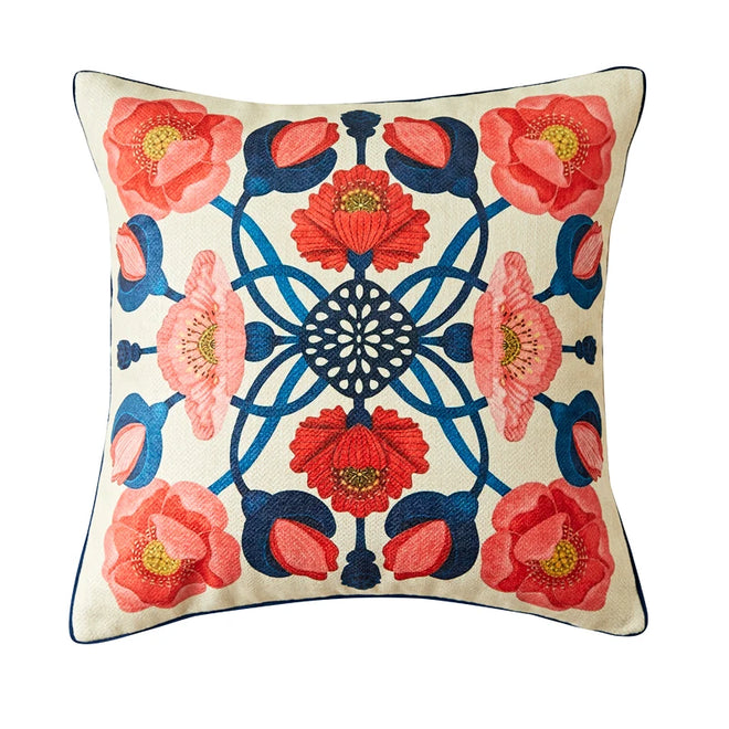 Red floral cushion cover by The Finishing Touch Decor featuring retro garden flower design for sofa and home decor.