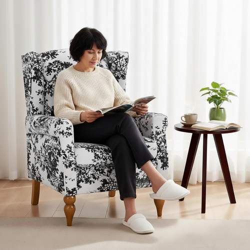 Upholstered floral wingback accent chair with matching small table, stylish small furniture piece by The Finishing Touch Decor