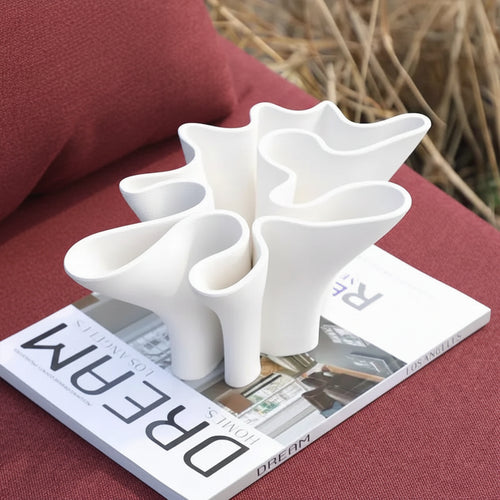 White ceramic Scandi vase with sculpted wave design, decorative vase from The Finishing Touch Decor.