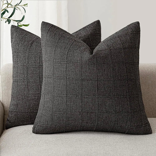 Textured neutral linen and cotton throw pillow covers from The Finishing Touch Decor, showcasing soft fabric and subtle design.