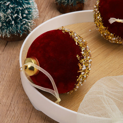 Red velvet and glitter Christmas ball ornaments for holiday decor, featuring festive red and sparkling accents.