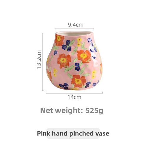 French hand-painted ceramic mug with floral design, used as a luxury home decor floral vase.