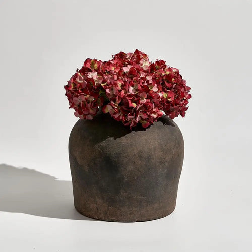 Brown ceramic rustic 11-inch decorative vase with textured finish, ideal for enhancing home decor.