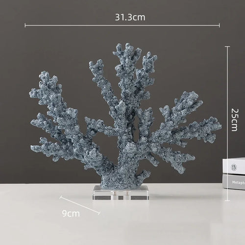 Blue resin simulated coral branch sculpture for table decor, crafted by The Finishing Touch Decor, ideal as artistic home accent.