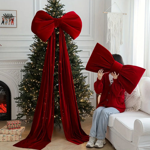 Large red velvet Christmas holiday decorative bow from The Finishing Touch Decor, perfect for festive holiday decorating.
