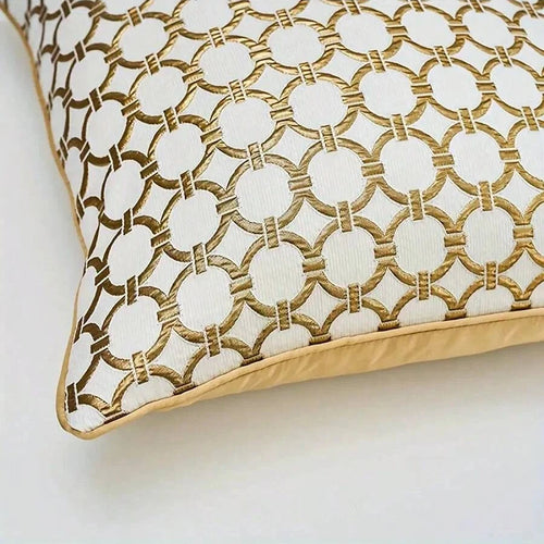 Gold chain link H style throw pillow cover from The Finishing Touch Decor with decorative gold chain design on soft fabric