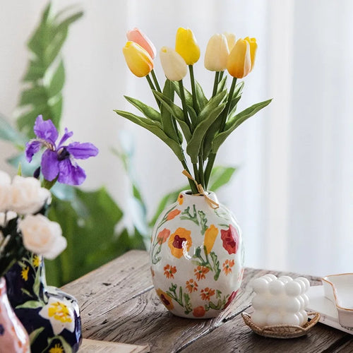 French hand-painted ceramic mug with floral design, used as a luxury home decor floral vase by The Finishing Touch Decor.