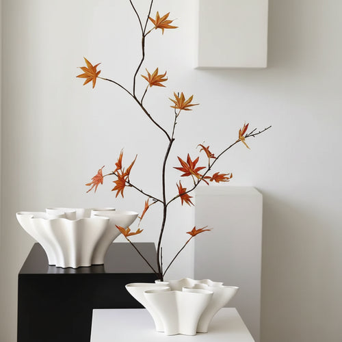 White ceramic Scandi vase with sculpted wave design, decorative vase from The Finishing Touch Decor featuring modern, minimalist style.