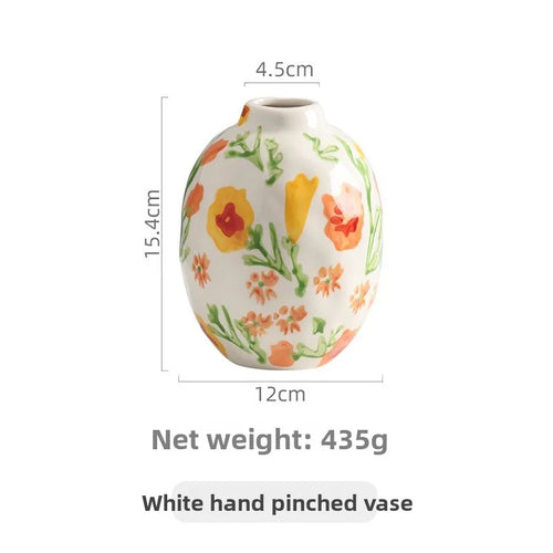 French hand-painted ceramic mug with floral design, used as a luxury home decor vase for retro flower arrangements.