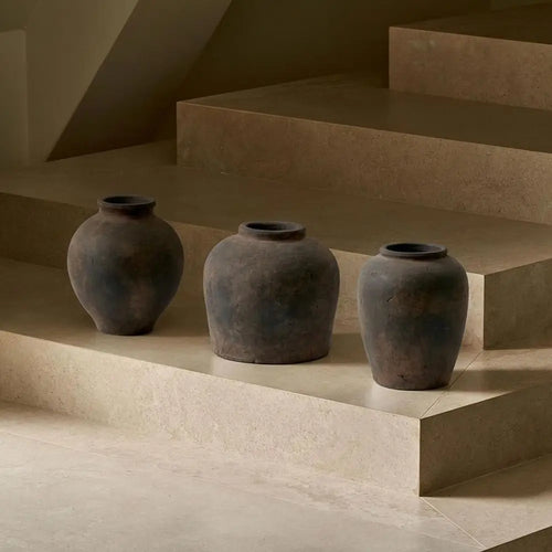 Rustic 11-inch brown ceramic decorative vase from The Finishing Touch Decor, showcasing a textured, earthy design.