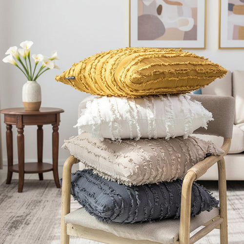 Boho textured fringe throw pillow cover with decorative tassels, designed for stylish home decor by The Finishing Touch Decor