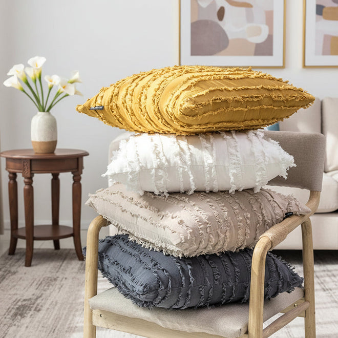 Boho textured fringe throw pillow cover with decorative tassels, designed for stylish home decor by The Finishing Touch Decor