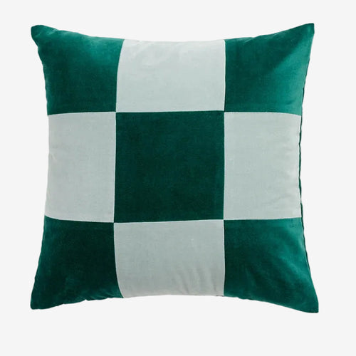 Colorful retro patchwork velvety throw pillows from The Finishing Touch Decor with vibrant, textured fabric and diverse patterns.