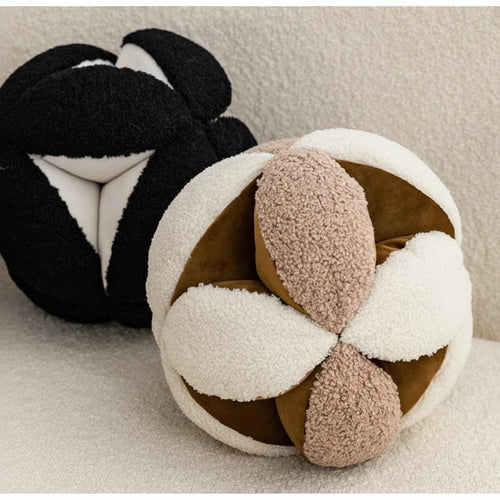 Modern round geometric throw pillow with ball design from The Finishing Touch Decor, featuring a stylish and contemporary look.