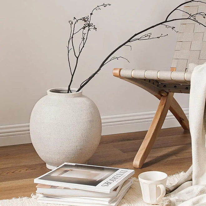 Large white sandstone ceramic round floor vase for decorative display, featuring smooth surface and elegant design.