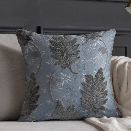Vibrant embroidered leaf design on decorative throw pillow cover from The Finishing Touch Decor, perfect for accent pillows.