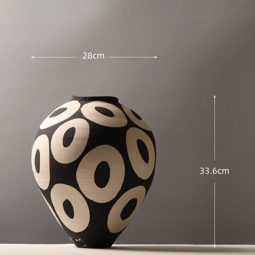 Hand-drawn geometric circles ceramic flower vase by The Finishing Touch Decor, ideal for flower arrangements and home decor.