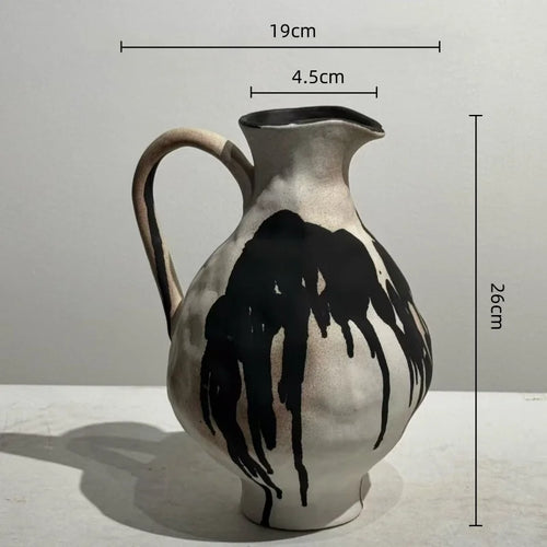 Irregular shape ink drip handmade decorative vase by The Finishing Touch Decor, featuring a unique artistic design and textured surface.