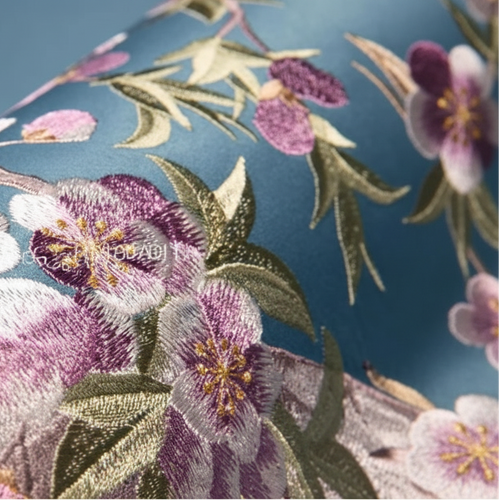 Luxury satin chinoiserie throw pillow cover by The Finishing Touch Decor with intricate Asian-inspired pattern and elegant sheen.