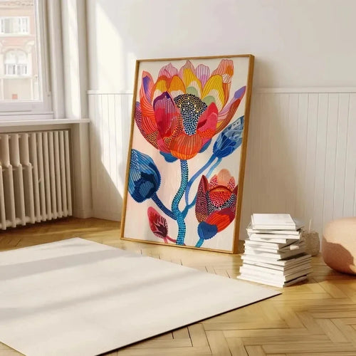 Colorful abstract botanical canvas wall art by The Finishing Touch Decor, featuring vibrant plant-inspired prints for living room decor.