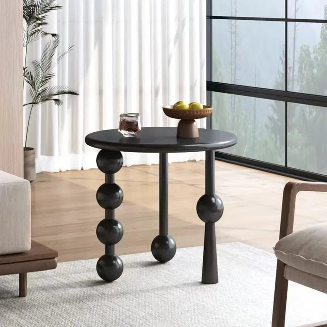 Scandinavian solid rubber wood small side table with creative design, ideal as a coffee or sofa table in living rooms.
