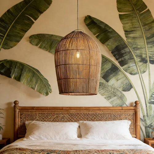 Wabi Sabi rattan wicker pendant light by The Finishing Touch Decor hanging from ceiling, showcasing natural woven rattan design.