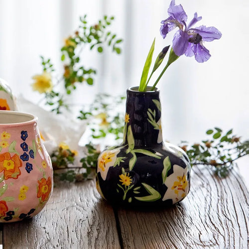 French hand-painted ceramic mug with floral design, used as a luxury home decor floral vase with retro flower arrangement.