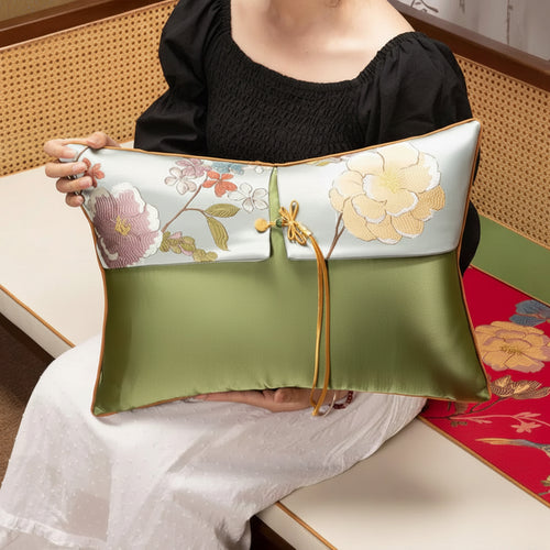Floral oriental embroidered satin throw pillow cover with intricate design, soft fabric, and elegant detailing from The Finishing Touch Decor.