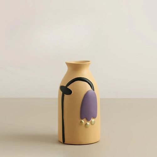 Colorful retro flower hand-painted decorative vase by The Finishing Touch Decor with vibrant floral patterns and a classic shape.