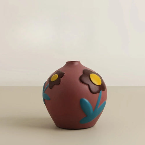 Colorful retro flower hand-painted decorative vase with vibrant floral designs, perfect for adding vintage charm to any space.