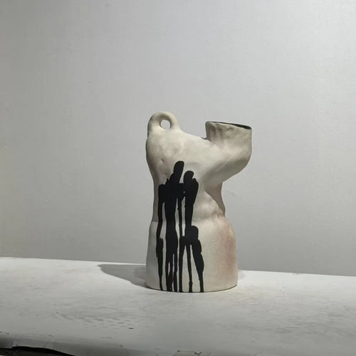 Handmade decorative vase with irregular shape and ink drip design, ideal for modern home decor, by The Finishing Touch Decor.