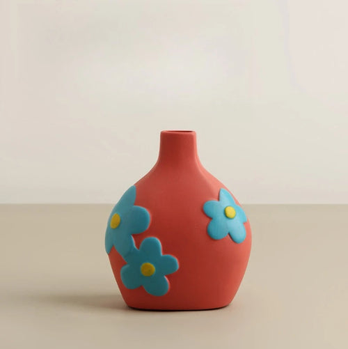 Colorful retro flower hand-painted decorative vase with vibrant floral designs, perfect for home decor.