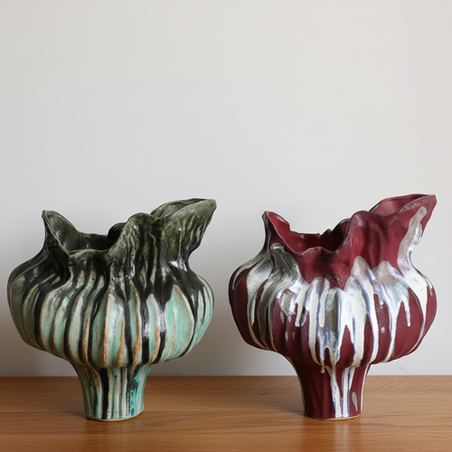 Irregular drip Wabi Sabi porcelain ceramic vase, decorative vase with an organic, imperfect design and earthy tones.