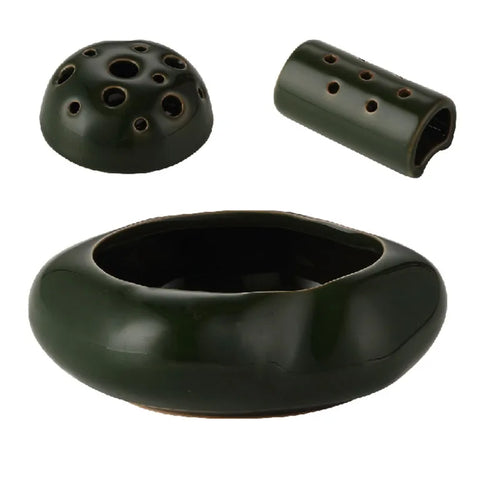 Japandi Lotus ceramic seedpod planter set by The Finishing Touch Decor, featuring sleek, minimalist planters with a modern design.