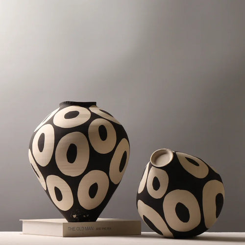 Hand-drawn geometric circles ceramic flower vase by The Finishing Touch Decor, ideal for flower arrangements and home decor.