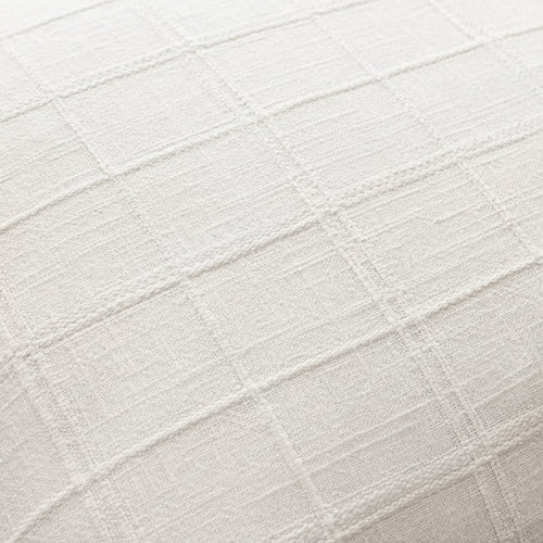 Textured neutral linen cotton throw pillow cover from The Finishing Touch Decor, showcasing a soft, natural fabric with subtle pattern.