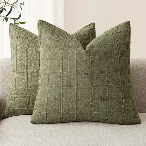 Textured neutral linen cotton throw pillow cover from The Finishing Touch Decor, showcasing a soft, woven fabric design.