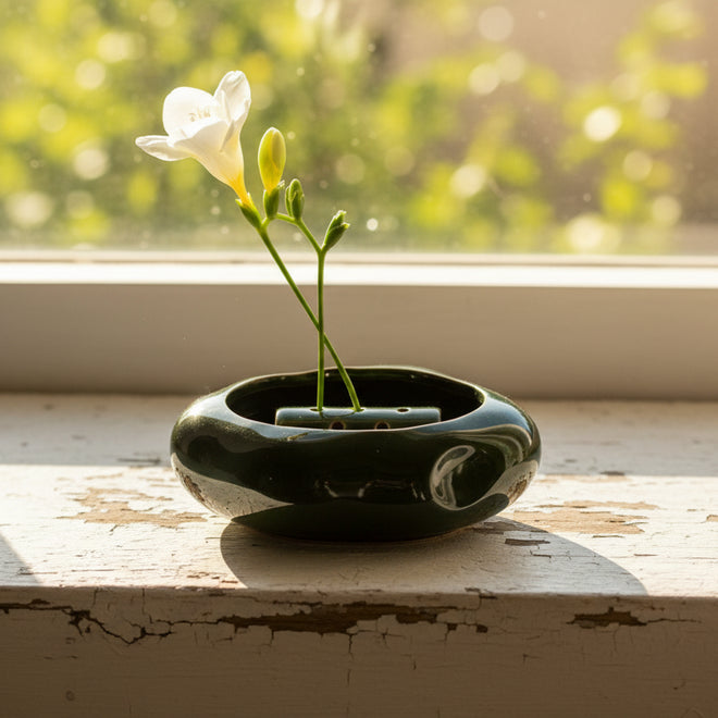 Japandi Lotus ceramic seedpod planter set by The Finishing Touch Decor, featuring minimalist lotus-shaped planters in neutral tones.
