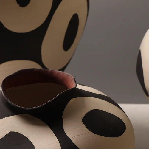 Hand-drawn geometric circles ceramic vase by The Finishing Touch Decor, ideal for flower arrangements and home decoration.